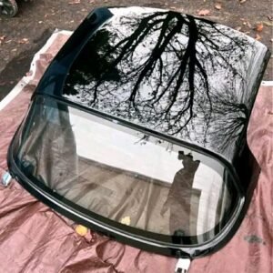 Oem black Miata hardtops.